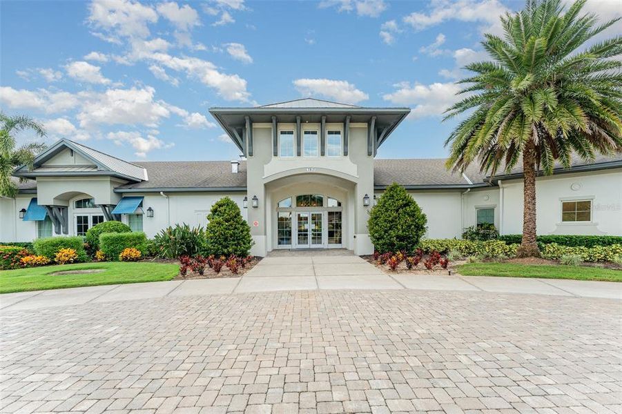 Front exterior of a new home in , Kissimmee, FL, highlighting curb appeal (Image 1).