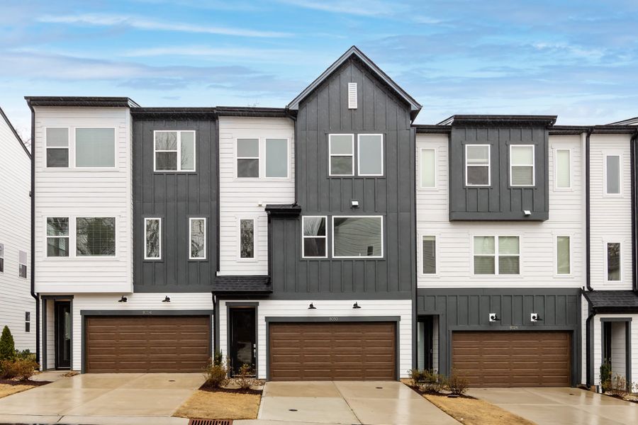Front exterior of a new home in Archer Row, Charlotte, NC, highlighting curb appeal (Image 1). Front exterior of a new home in Archer Row, Charlotte, NC, highlighting curb appeal (Image 1).