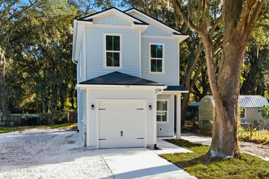 Front exterior of a new home in , Jacksonville, FL, highlighting curb appeal (Image 1). Front exterior of a new home in , Jacksonville, FL, highlighting curb appeal (Image 1).