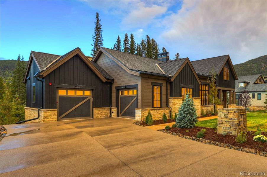 Front exterior of a new home in , Keystone, CO, highlighting curb appeal (Image 20).