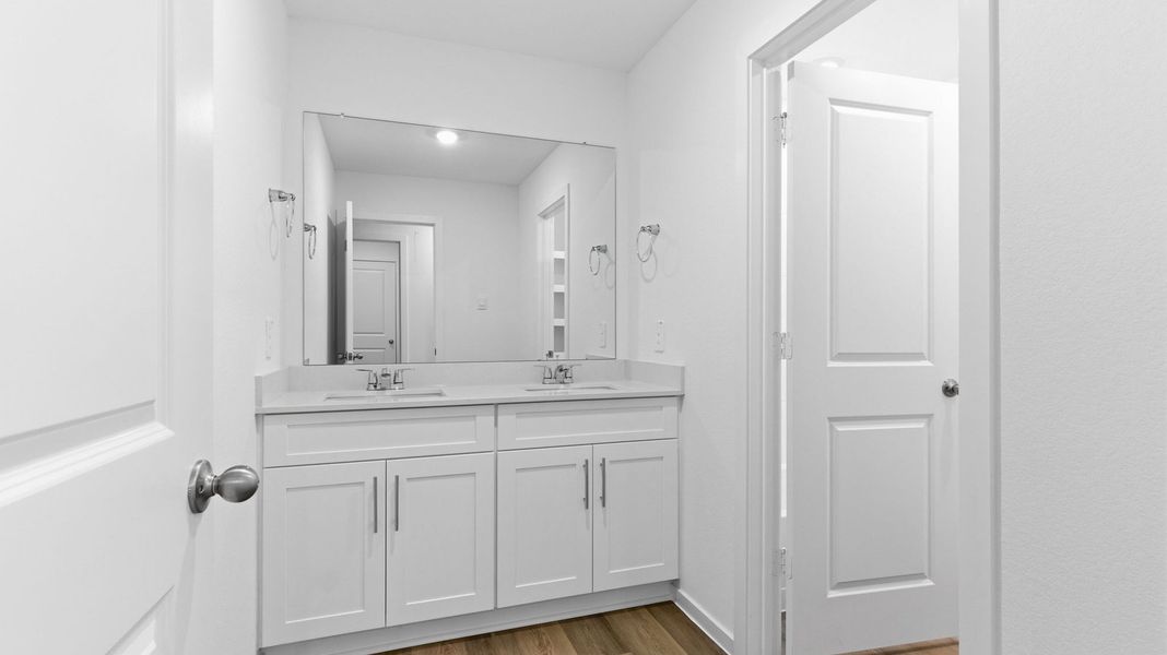 Furnished interior view inside a new home in Lakes at Westland Ranch, League City (Image 6).