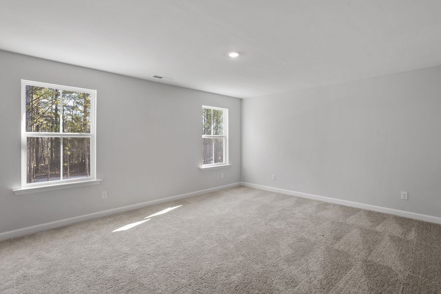 Spacious, unfurnished interior of a new home in Sweetbrier, Durham (Image 29).