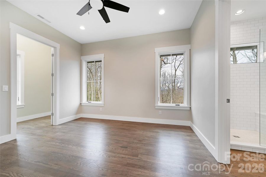 Spacious, unfurnished interior of a new home in , Pisgah Forest (Image 18).