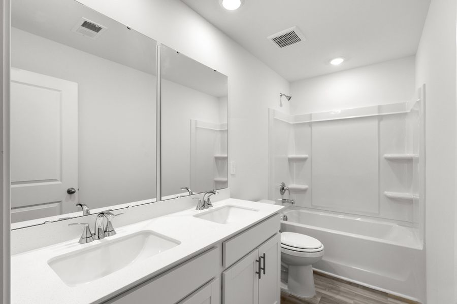 Furnished interior view inside a new home in Waterside - Boardwalk Series, Longs (Image 8).