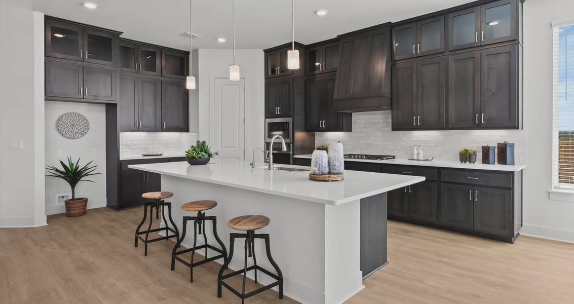Representative furnished interior of a home built from the Waterloo by Chesmar Homes in Village at Three Oaks, Seguin (Image 11). Representative furnished interior of a home built from the Waterloo by Chesmar Homes in Village at Three Oaks, Seguin (Image 11).