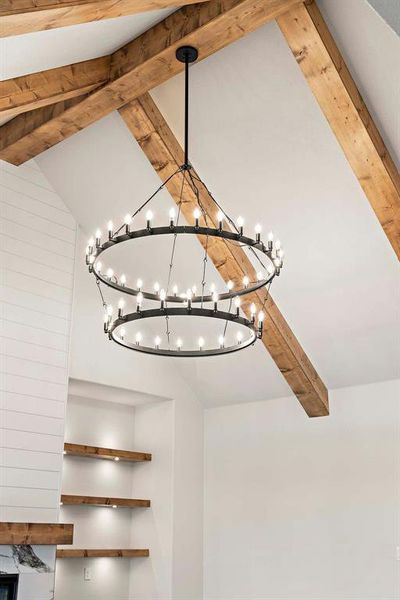 Detailed view of beam ceiling and a chandelier