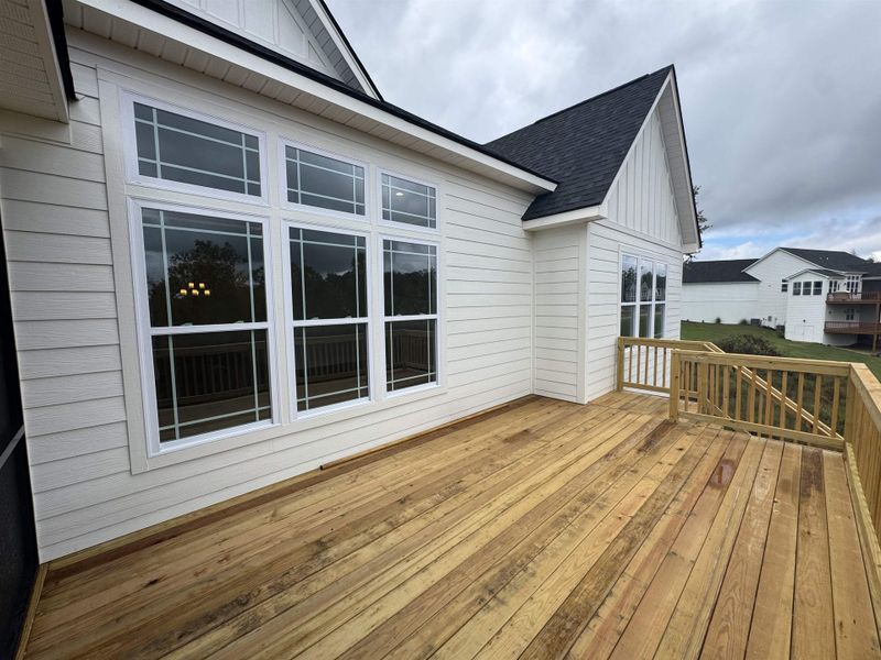 Exterior details and patio area of a home in Pointe Summit, Slater-Marietta (Image 3).