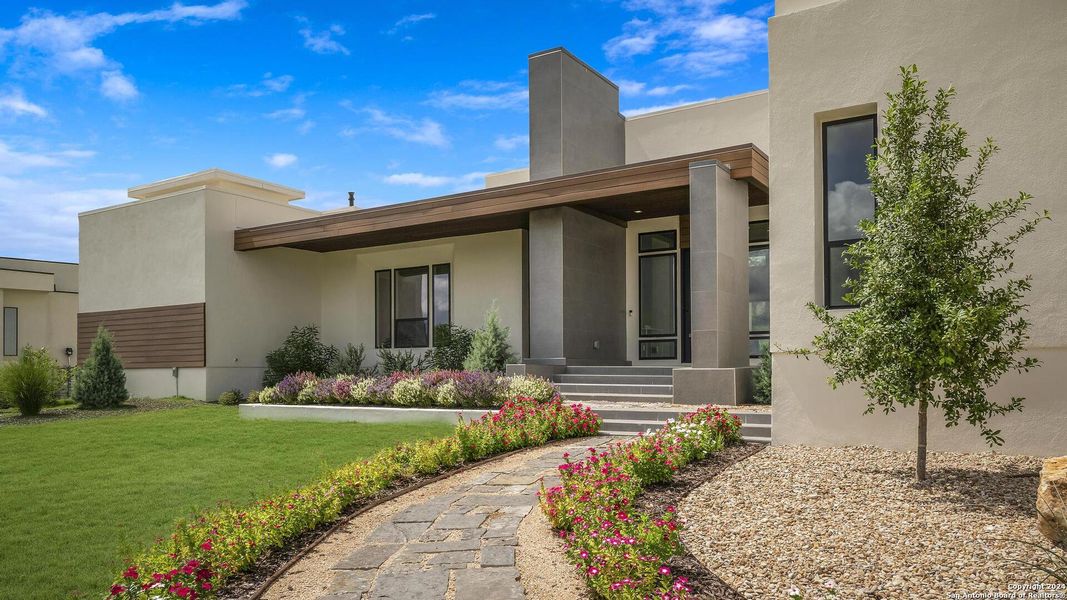 Front exterior of a new home in , San Antonio, TX, highlighting curb appeal (Image 25).