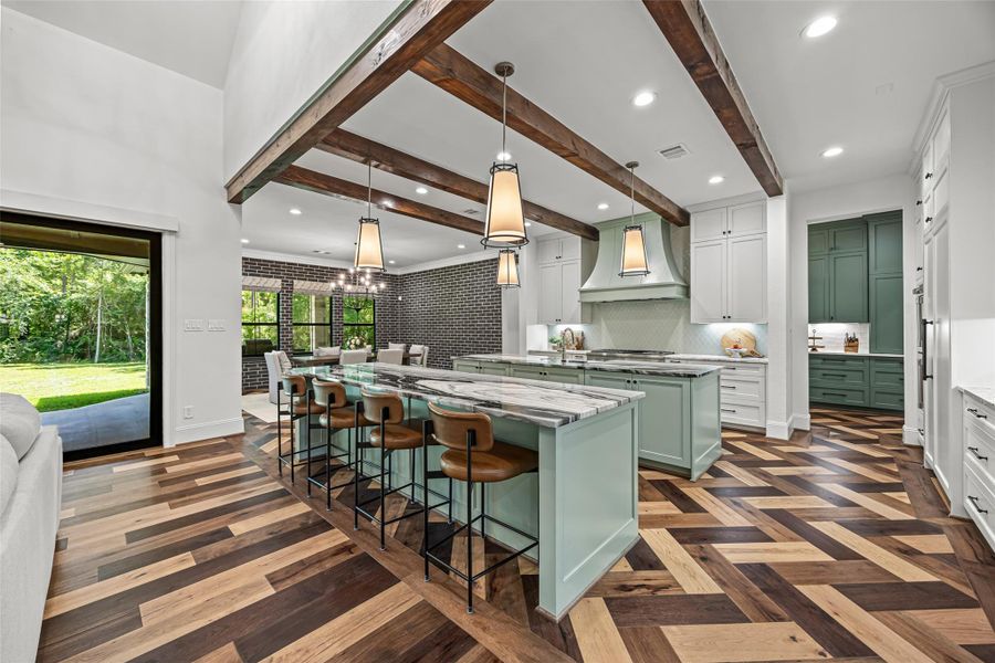 Featuring two functional islands, perfect for cooking, prep, and entertaining Featuring two functional islands, perfect for cooking, prep, and entertaining