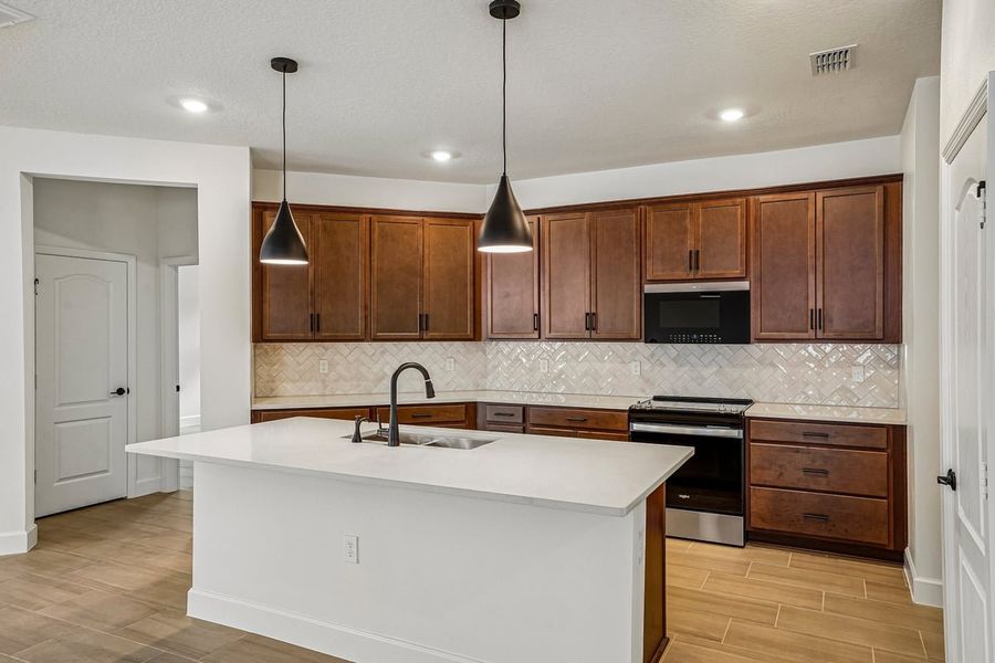 Furnished interior view inside a new home in Oasis Reserve, Orlando (Image 4).