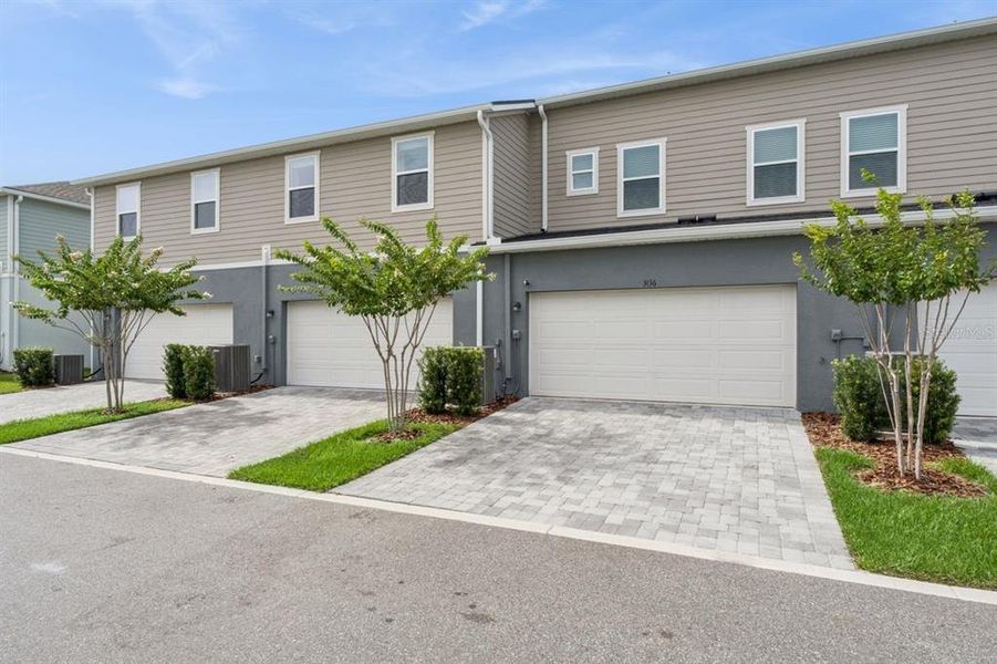 Front exterior of a new home in , Apopka, FL, highlighting curb appeal (Image 25). Front exterior of a new home in , Apopka, FL, highlighting curb appeal (Image 25).