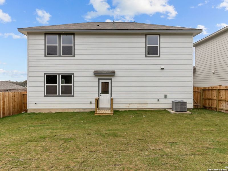 Exterior details and patio area of a home in Royal Crest, San Antonio (Image 3).