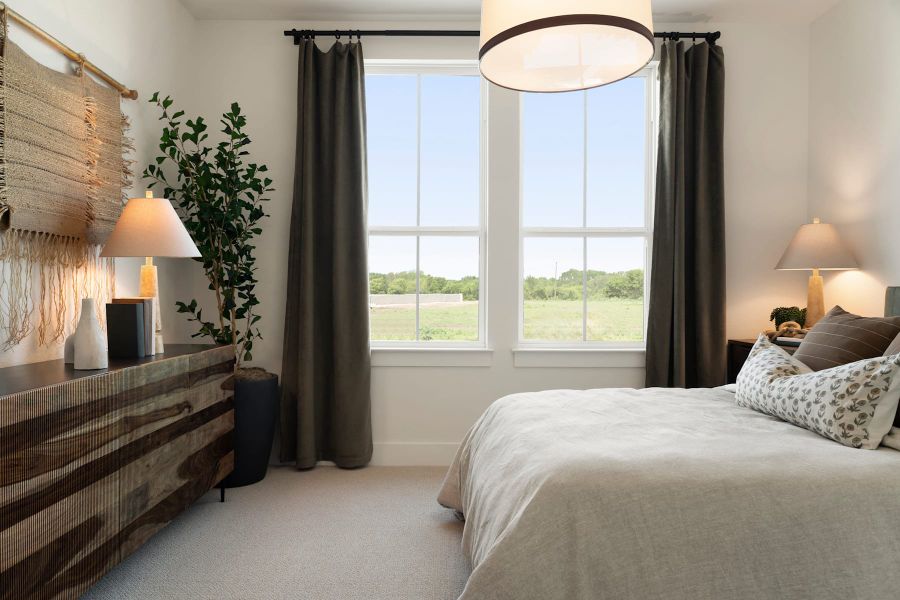 Furnished interior view inside a new home in Wolf Ranch, Georgetown (Image 29).