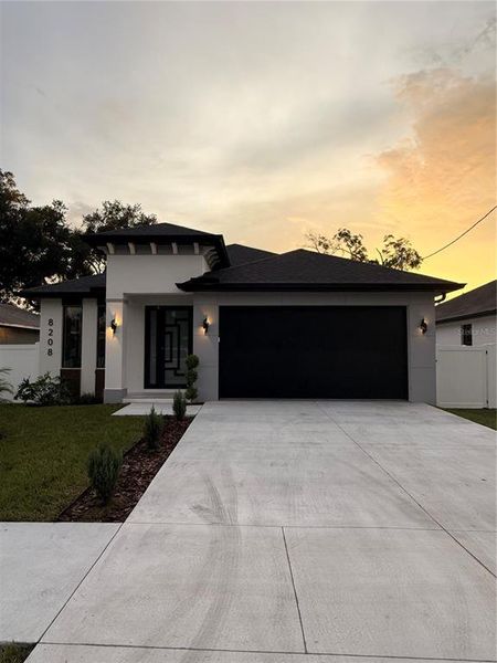 Front exterior of a new home in , Tampa, FL, highlighting curb appeal (Image 22).