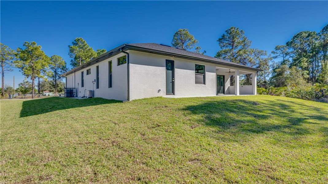Exterior details and patio area of a home in , Lehigh Acres (Image 3). Exterior details and patio area of a home in , Lehigh Acres (Image 3).
