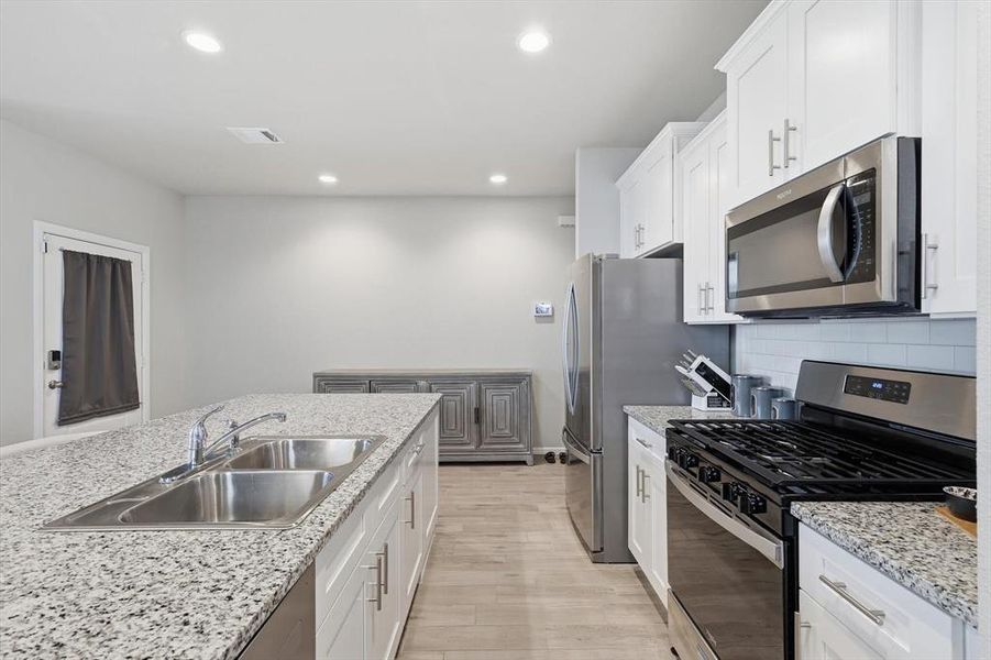 Furnished interior view inside a new home in , Fort Worth (Image 7). Furnished interior view inside a new home in , Fort Worth (Image 7).