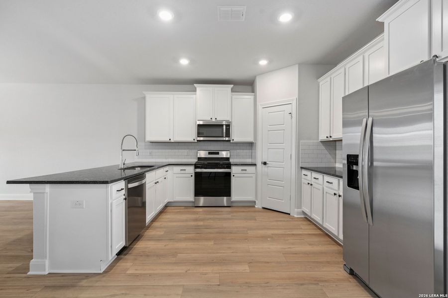 Furnished interior view inside a new home in Hightop Ridge, Converse (Image 6). Furnished interior view inside a new home in Hightop Ridge, Converse (Image 6).
