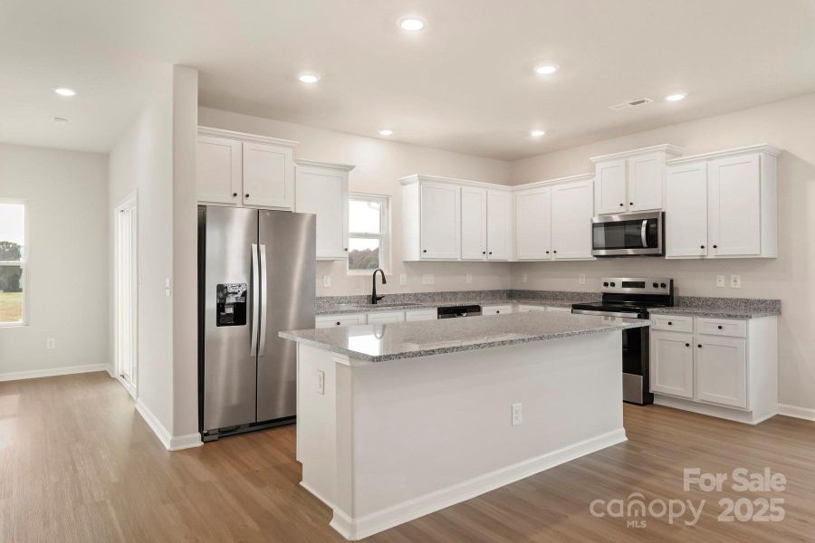 Furnished interior view inside a new home in Stagecoach Station, Gastonia (Image 5).