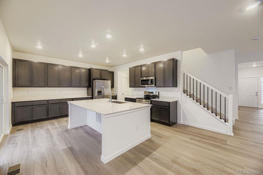 Furnished interior view inside a new home in Ken-Caryl Ranch, Littleton (Image 7).