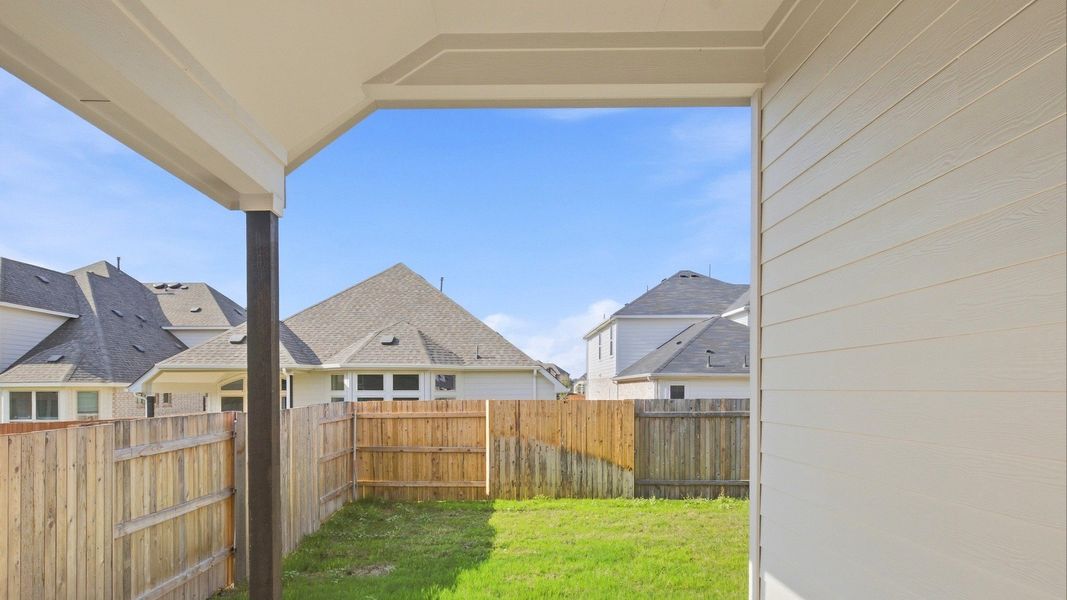 Exterior details and patio area of a home in Sunfield, Buda (Image 2). Exterior details and patio area of a home in Sunfield, Buda (Image 2).