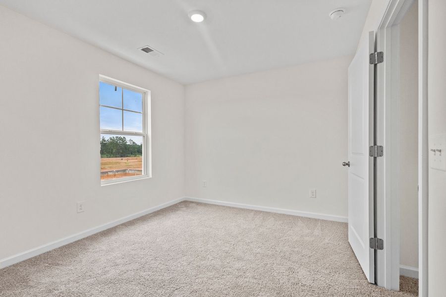 Spacious, unfurnished interior of a new home in Champions Village at Cherry Hill, Pendleton (Image 23).