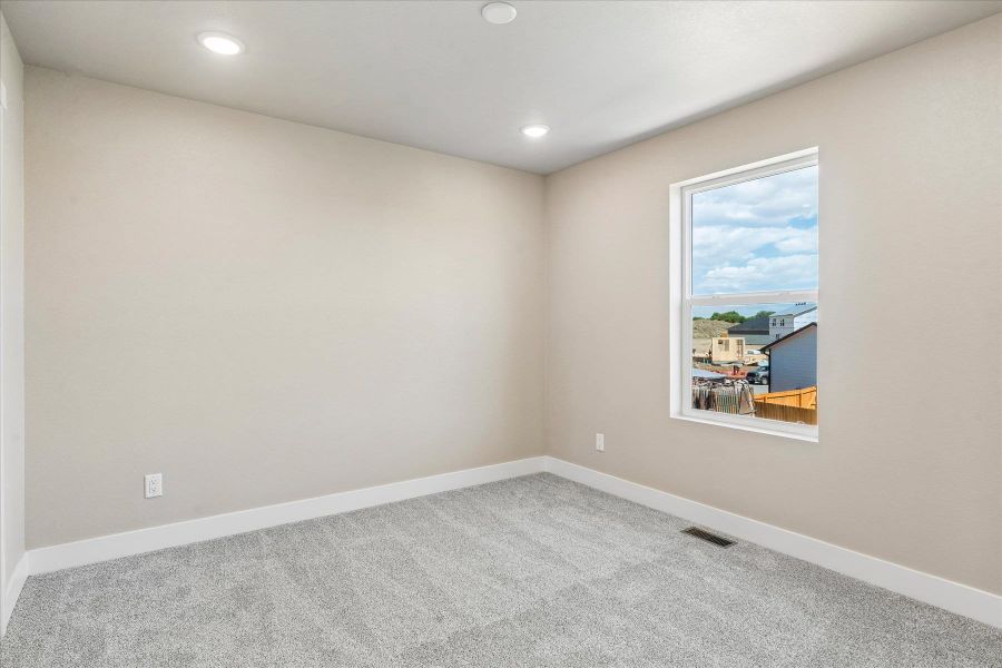 Spacious, unfurnished interior of a new home in The Glen-12, Colorado Springs (Image 19).
