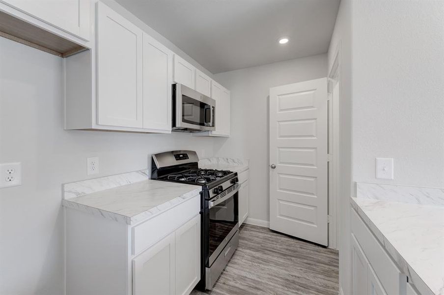 Furnished interior view inside a new home in Colony Park, Eastland (Image 9).