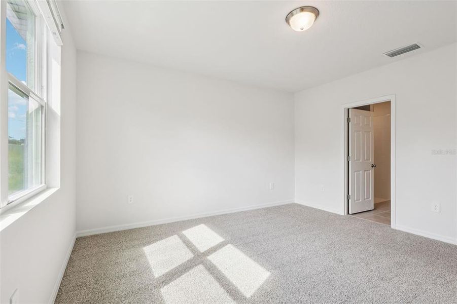 Spacious, unfurnished interior of a new home in Bradbury Creek - Signature Series, Haines City (Image 31).