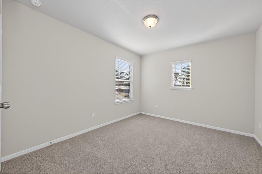 Spacious, unfurnished interior of a new home in Woodland Lakes, Houston (Image 40).