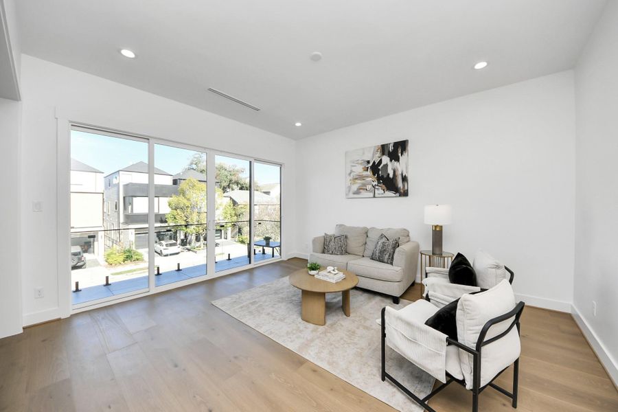 Light-filled game room/flex area!