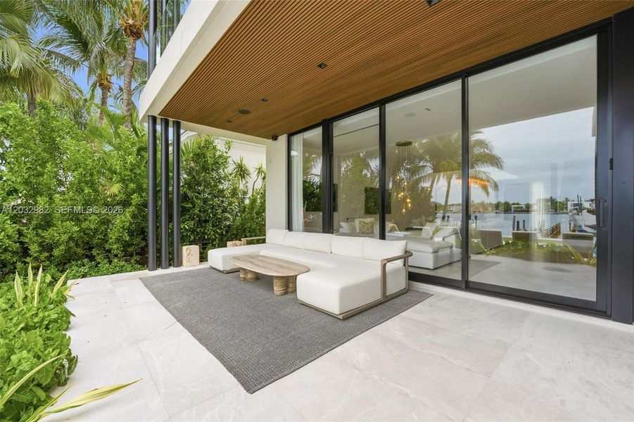Exterior details and patio area of a home in , Miami Beach (Image 21). Exterior details and patio area of a home in , Miami Beach (Image 21).