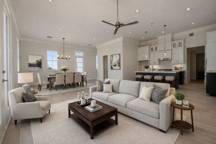 Twelve foot ceilings and tons of natural light in this first floor living and dining space.  Virtual staging added.