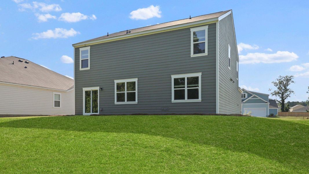 Front exterior of a new home in Lakeview at Kitfield, Moncks Corner, SC, highlighting curb appeal (Image 19). Front exterior of a new home in Lakeview at Kitfield, Moncks Corner, SC, highlighting curb appeal (Image 19).