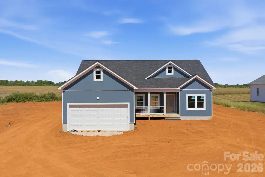 Front exterior of a new home in , Olin, NC, highlighting curb appeal (Image 5).