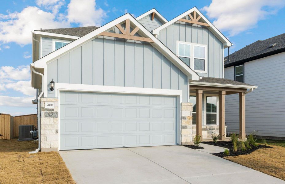 Front exterior of a new home in Patterson Ranch, Georgetown, TX, highlighting curb appeal (Image 1). Front exterior of a new home in Patterson Ranch, Georgetown, TX, highlighting curb appeal (Image 1).