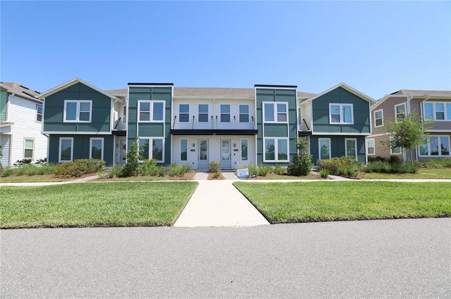 Front exterior of a new home in , St. Cloud, FL, highlighting curb appeal (Image 1). Front exterior of a new home in , St. Cloud, FL, highlighting curb appeal (Image 1).