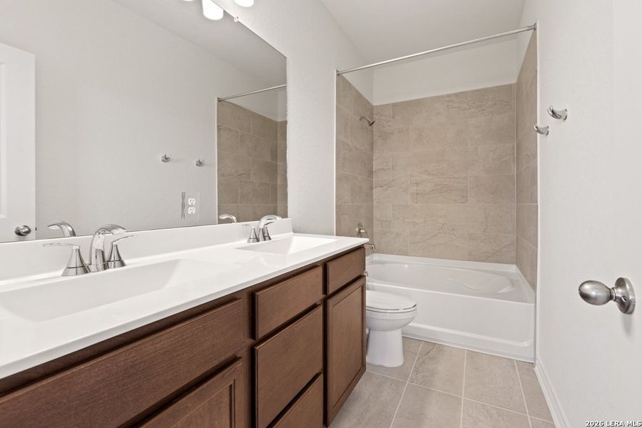 Furnished interior view inside a new home in Woodside Farms, Seguin (Image 7).