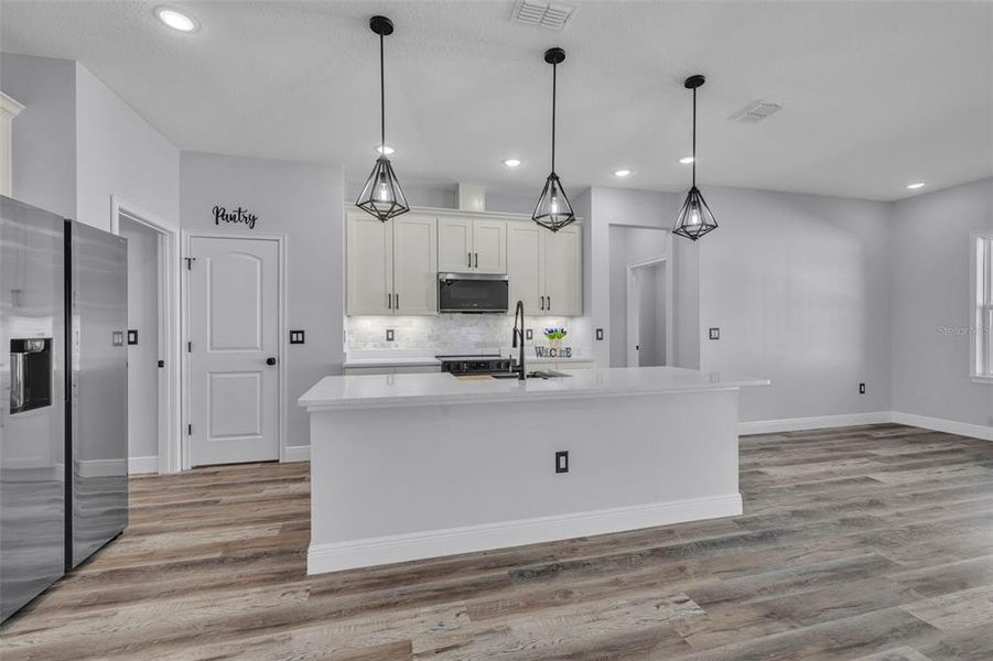 Furnished interior view inside a new home in , Poinciana (Image 11). Furnished interior view inside a new home in , Poinciana (Image 11).