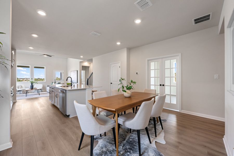 Representative furnished interior of a home built from the Granbury by Ashton Woods in The Trails at Carmel, Pflugerville (Image 8).