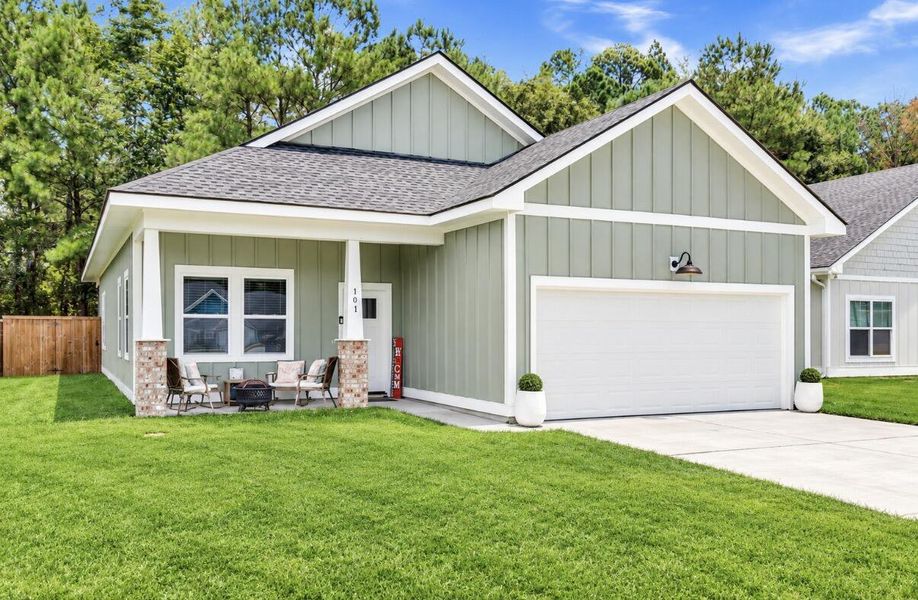 Front exterior of a new home in , Huger, SC, highlighting curb appeal (Image 22).