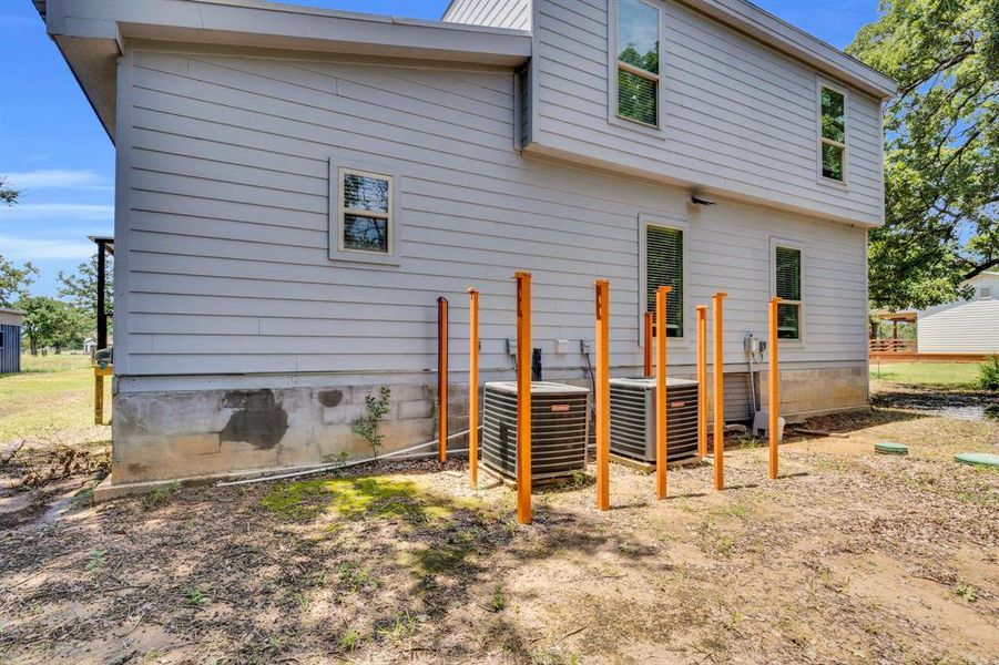 Back of house with cooling unit