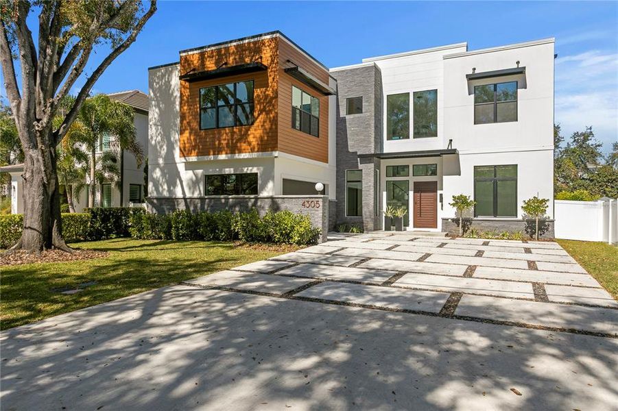 Front exterior of a new home in , Tampa, FL, highlighting curb appeal (Image 31).