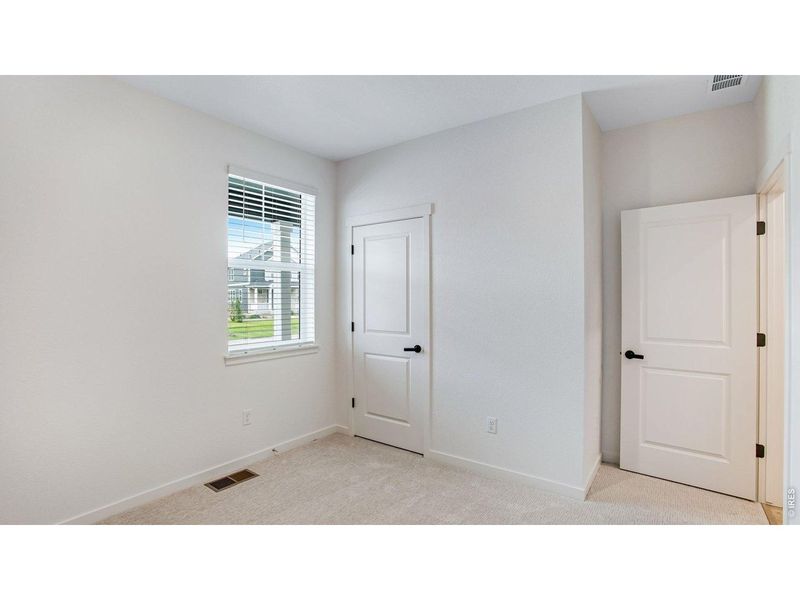 Spacious, unfurnished interior of a new home in Hansen Farm, Fort Collins (Image 30).