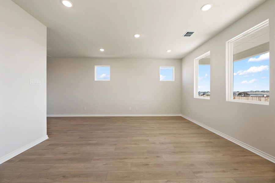 Spacious, unfurnished interior of a new home in The Homestead at Lariat, Liberty Hill (Image 40).