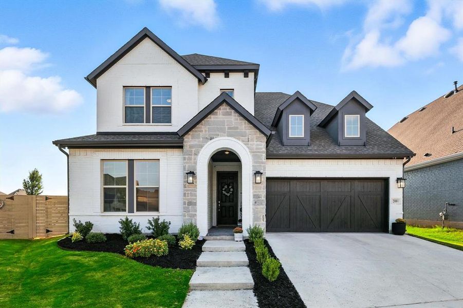 Front exterior of a new home in , Argyle, TX, highlighting curb appeal (Image 19). Front exterior of a new home in , Argyle, TX, highlighting curb appeal (Image 19).