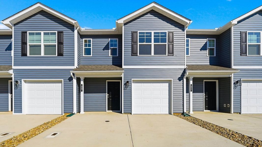 Front exterior of a new home in Warren's Way Townhomes, Jonesborough, TN, highlighting curb appeal (Image 1). Front exterior of a new home in Warren's Way Townhomes, Jonesborough, TN, highlighting curb appeal (Image 1).