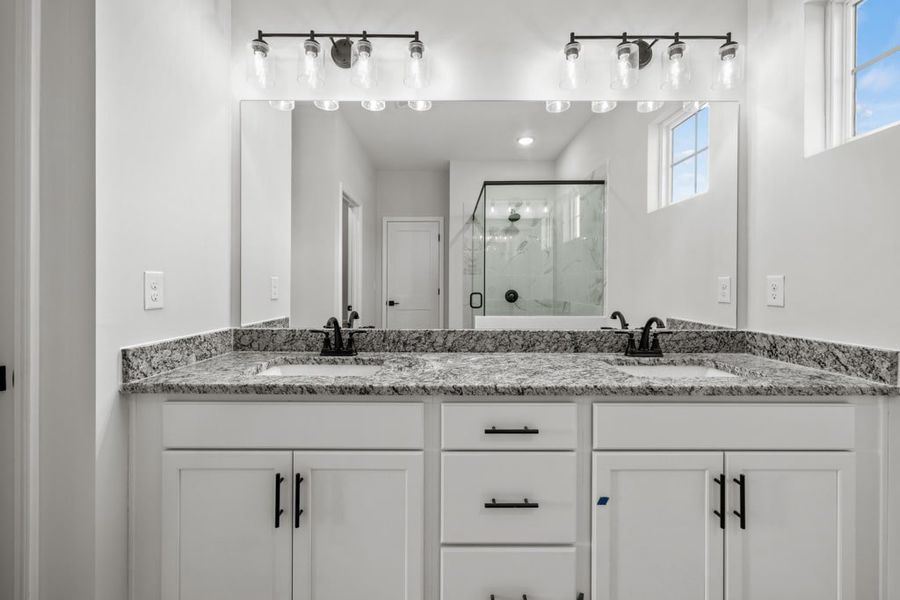 Representative furnished interior of a home built from the The Baldwin by UnionMain Homes in Austin Springs, Bethlehem (Image 12).