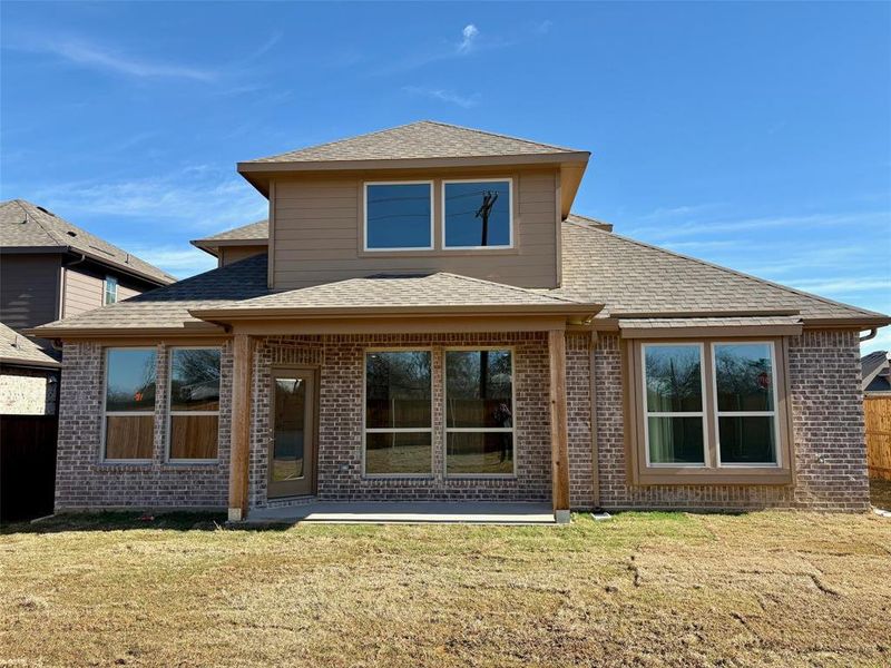 Exterior details and patio area of a home in Courts Of Bonnie Brae, Denton (Image 3).