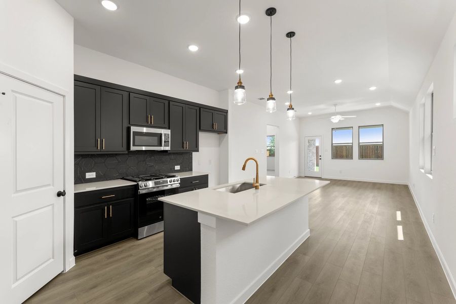Open Kitchen-Living-Dining Room Representative Photo featuring the Noir Collection