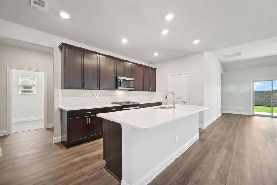 Photo is not of the actual home, but is an inspirational photo of builder’s model home and may depict options, furnishings, and/or decorator features that are not included.